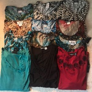 Lot of Women’s XL dressy shirts.